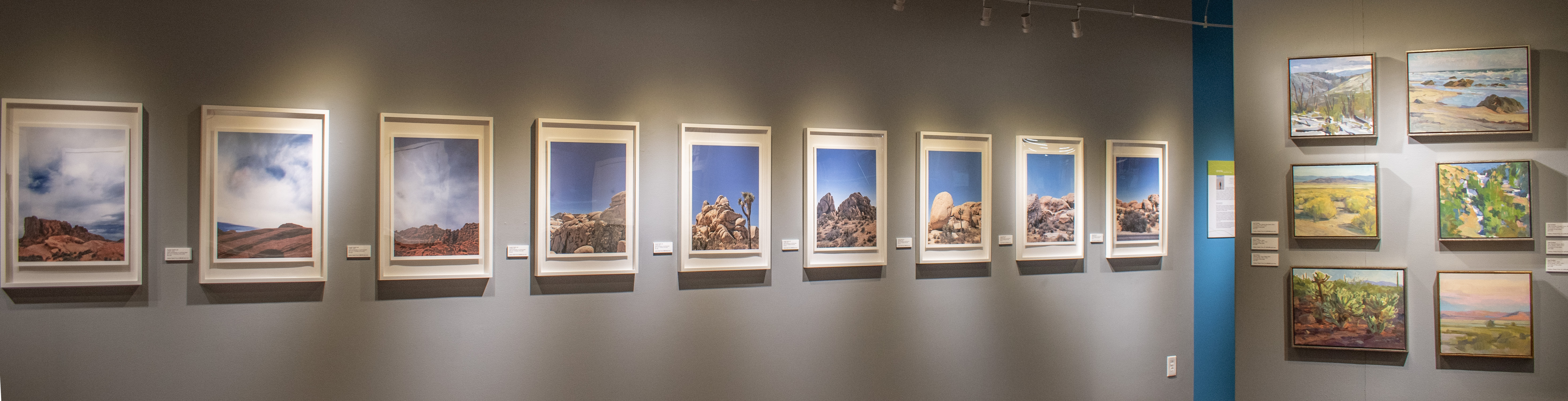 A panoramic photograph of right wall of gallery displaying artwork of Crystal Yachin Lee